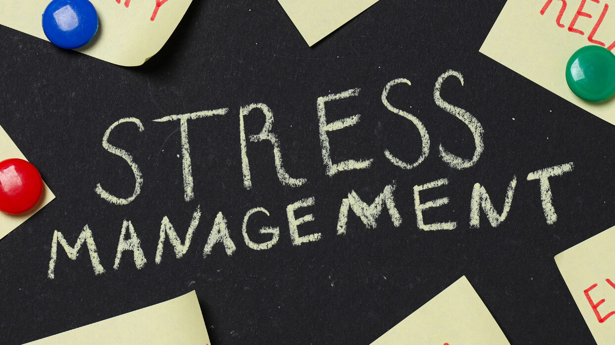  Chalkboard with sticky notes showing stress management tips like music, therapy, hobby, exercise, and relaxation methods. Abhishek tanwar | xpodcasts

